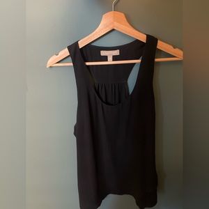 Banana Republic black racerback dress tank with cross cross detail. Size Medium
